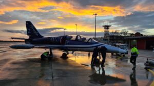 YL-KSJ with cloudy sunset in Brindisi Airport